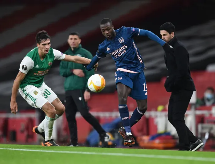 Framed Print : Arsenal's Pepe Faces Off in Empty Emirates: A UEFA Europa League Showdown against Rapid Wien, 2020