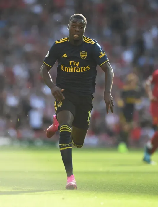 Framed Print : Arsenal's Pepe Faces Off Against Liverpool in Premier League Showdown 2019-20 Framed Print : Arsenal's Pepe Faces Off Against Liverpool in Premier League Showdown 2019-20