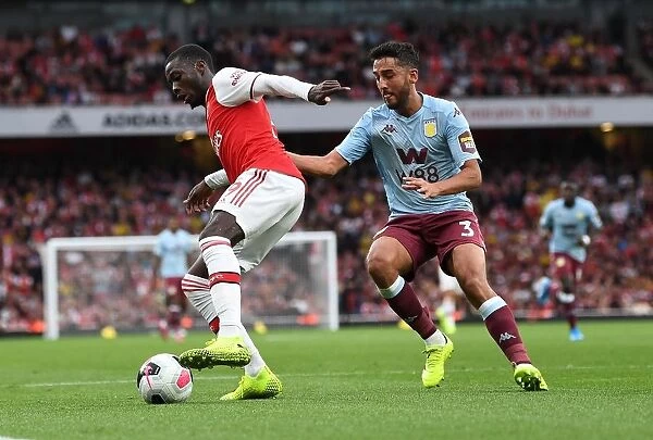 Arsenal's Pepe Faces Off Against Villa's Taylor in Premier League Clash