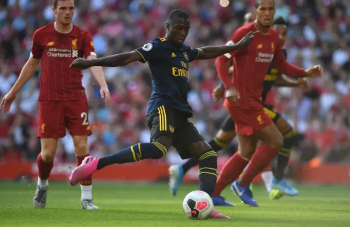 Framed Print : Arsenal's Pepe Goes Head-to-Head with Liverpool: Premier League Showdown, 2019-20