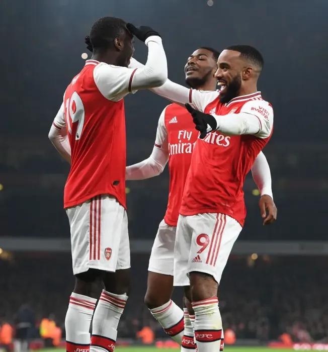 Framed Print : Arsenal's Pepe and Lacazette Celebrate First Goal Against Manchester United (2019-20) Framed Print : Arsenal's Pepe and Lacazette Celebrate First Goal Against Manchester United (2019-20)