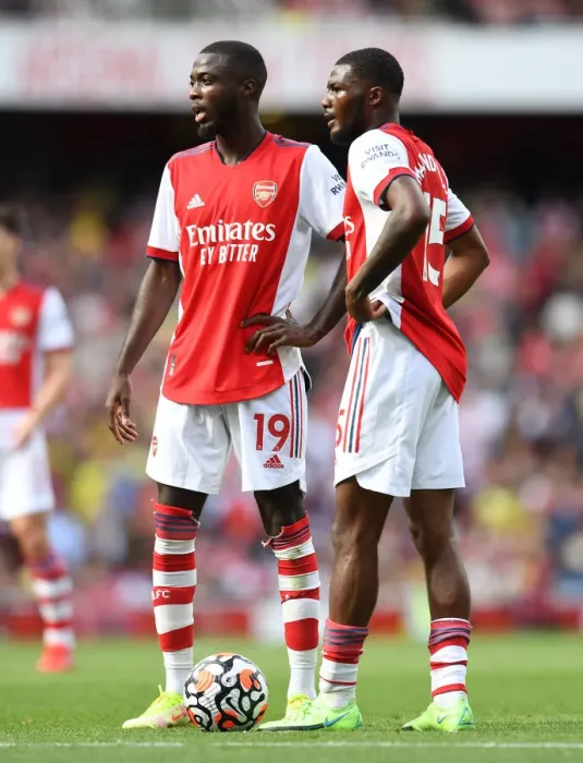 Framed Print : Arsenal's Pepe and Maitland-Niles in Action against Norwich City (2021-22) Framed Print : Arsenal's Pepe and Maitland-Niles in Action against Norwich City (2021-22)