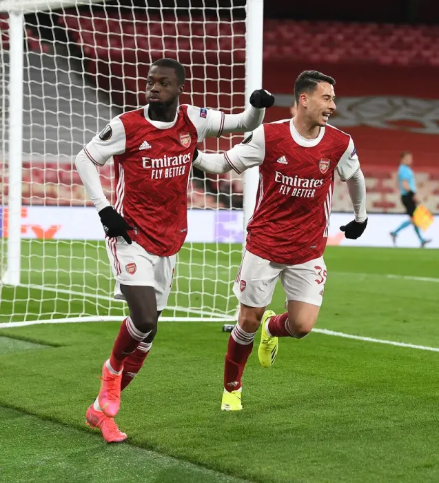 Framed Print : Arsenal's Pepe and Martinelli Celebrate Goal in Empty Emirates Stadium - UEFA Europa League Quarterfinal Framed Print : Arsenal's Pepe and Martinelli Celebrate Goal in Empty Emirates Stadium - UEFA Europa League Quarterfinal