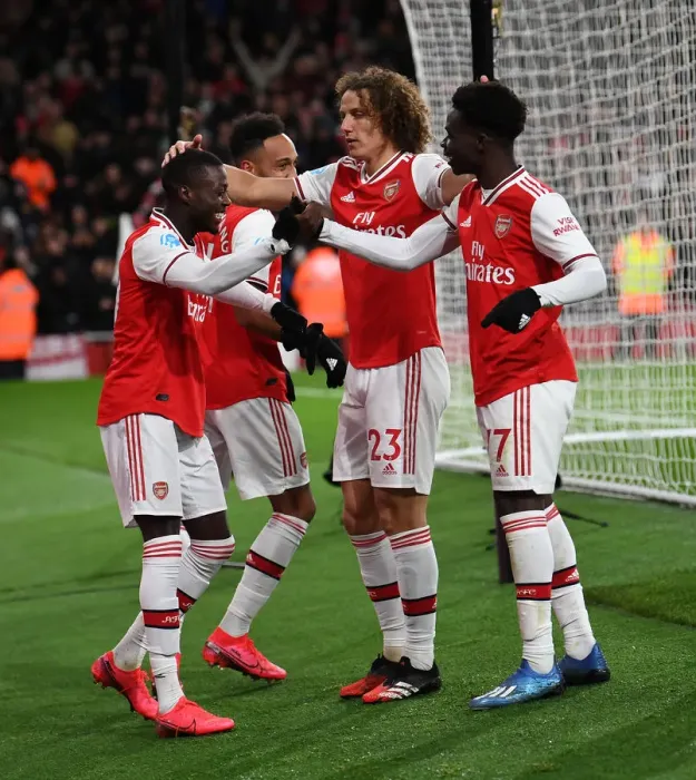 Framed Print : Arsenal's Pepe and Saka Celebrate Goal vs Newcastle United (2019-20) Framed Print : Arsenal's Pepe and Saka Celebrate Goal vs Newcastle United (2019-20)
