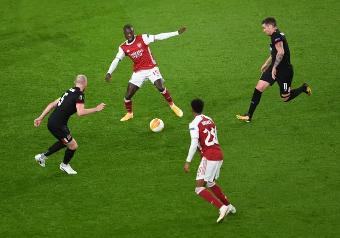 Framed Print : Arsenal's Pepe Scores in Empty Emirates: Arsenal FC vs Dundalk FC, UEFA Europa League 2020-21