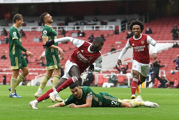 Arsenal's Pepe and Willian Celebrate Goal Against Sheffield United (2020-21)