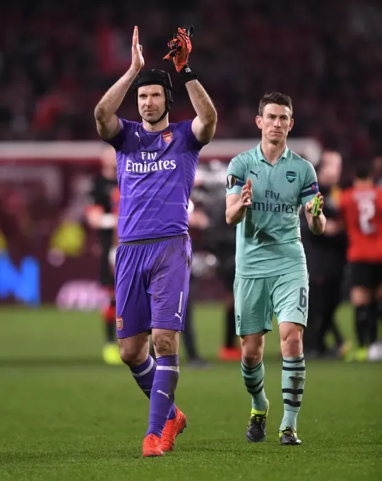 Framed Print : Arsenal's Petr Cech and Laurent Koscielny Celebrate with Fans after First Leg of Europa League Match against Stade Rennais