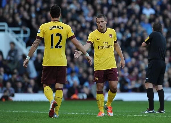 Arsenal's Podolski and Giroud in Action against West Ham United (2012-13)