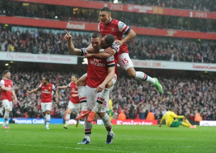 Framed Print : Arsenal's Podolski Scores Third Goal vs Norwich City (2012-13)