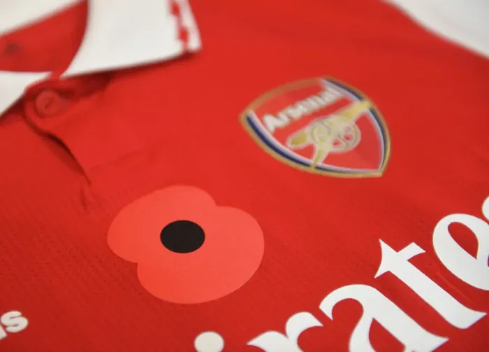 Framed Print : Arsenal's Poppy-Adorned Jerseys: Arsenal vs. Brighton & Hove Albion, Carabao Cup 2022-23