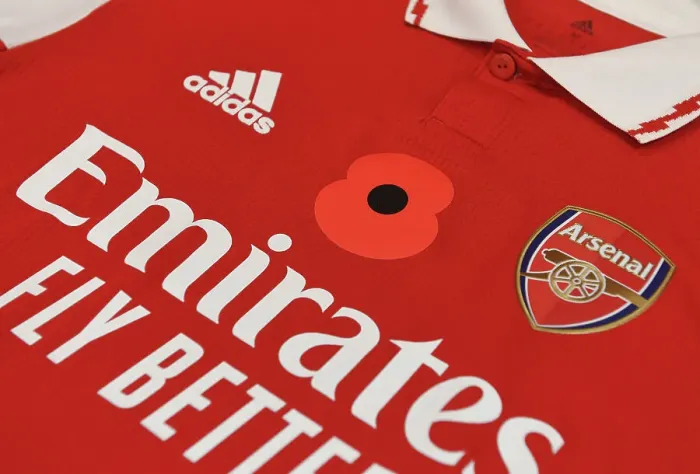 Framed Print : Arsenal's Poppy-Emblazoned Jerseys: Arsenal vs Brighton & Hove Albion, Carabao Cup 2022-23