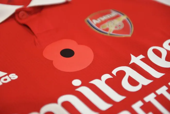 Framed Print : Arsenal's Poppy-Emblazoned Jerseys: Arsenal vs Brighton & Hove Albion in Carabao Cup 2022-23