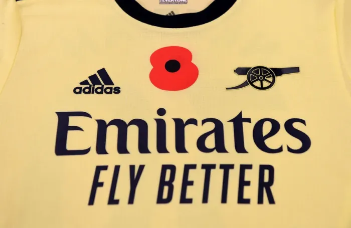 Framed Print : Arsenal's Poppy Shirts in Leicester Away Changing Room - Premier League 2021-22