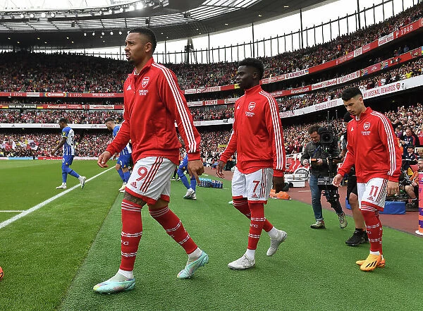 Arsenal's Pre-Match Huddle: Jesus, Saka, and Martinelli at Emirates Stadium (Arsenal v Brighton & Hove Albion, 2022-23)