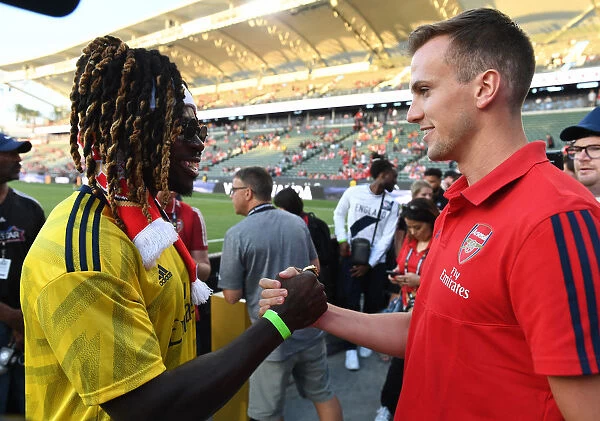 Arsenal's Pre-Season Encounter with Bayern Munich in Los Angeles: Rob Holding and Jay Ajayi Share a Moment