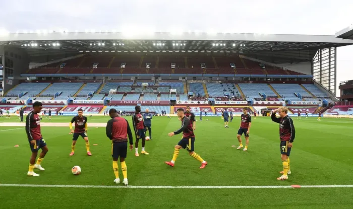 Framed Print : Arsenal's Premier League Showdown at Aston Villa: Warm-Up Moments
