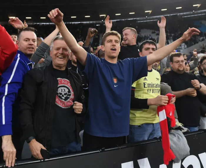 Framed Print : Arsenal's Premier League Triumph: Fans Euphoric Reaction vs. West Ham United