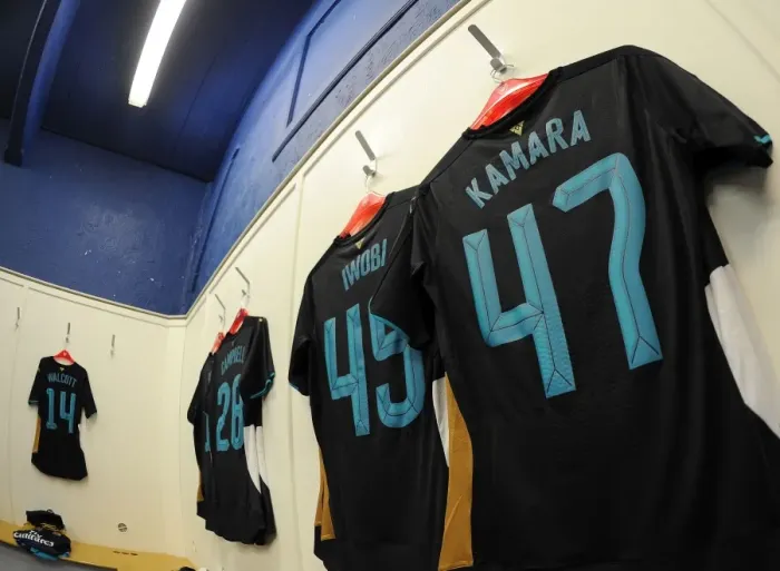 Framed Print : Arsenal's Preparations: Arsenal Kit on Display at Sheffield Wednesday's Hillsborough Stadium for Capital One Cup Match Framed Print : Arsenal's Preparations: Arsenal Kit on Display at Sheffield Wednesday's Hillsborough Stadium for Capital One Cup Match