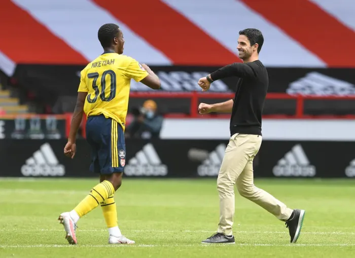 Framed Print : Arsenal's Quarter Final Victory: Mikel Arteta Fists Up with Eddie Nketiah after Sheffield United FA Cup Clash