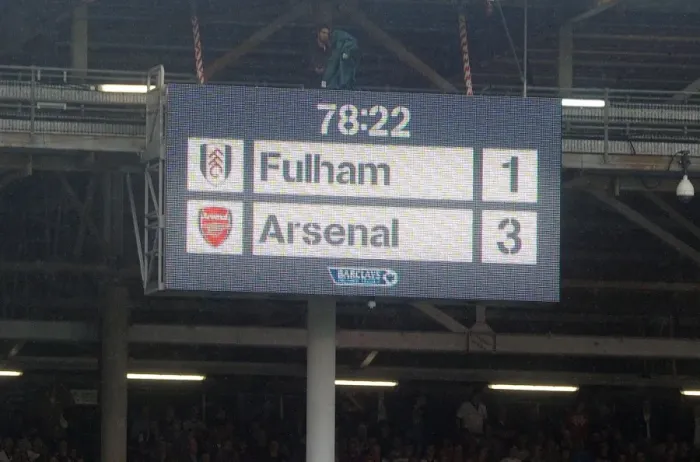 Framed Print : Arsenal's Quest for Victory: Fulham vs Arsenal, Premier League 2013-14