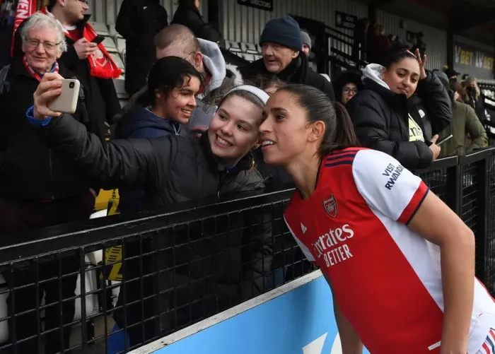 Framed Print : Arsenal's Rafaelle and Fan Celebrate Selfie Moment After Arsenal Women's Victory Over Manchester United (2021-22) Framed Print : Arsenal's Rafaelle and Fan Celebrate Selfie Moment After Arsenal Women's Victory Over Manchester United (2021-22)