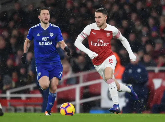 Framed Print : Arsenal's Ramsey Battles Arter in Premier League Clash vs. Cardiff City Framed Print : Arsenal's Ramsey Battles Arter in Premier League Clash vs. Cardiff City