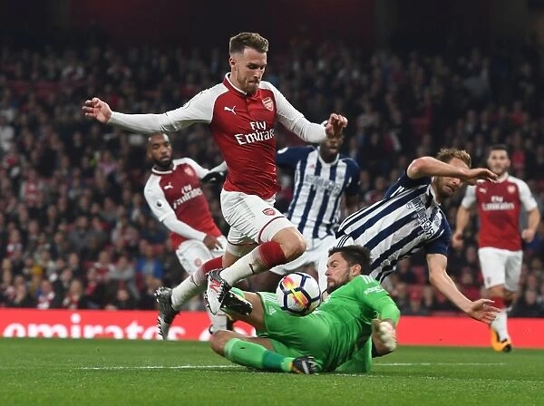Arsenal's Ramsey Battles Foster in Premier League Clash