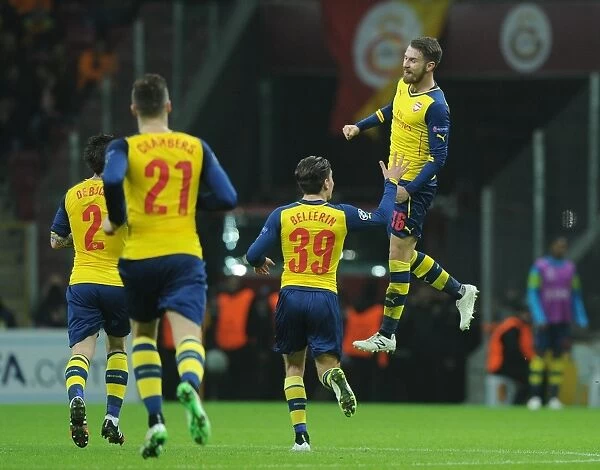 Arsenal's Ramsey and Bellerin Celebrate Goal Against Galatasaray in UEFA Champions League