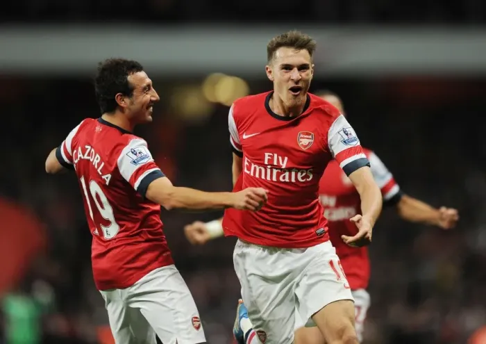 Framed Print : Arsenal's Ramsey and Cazorla Celebrate Goals Against Liverpool (2013-14)