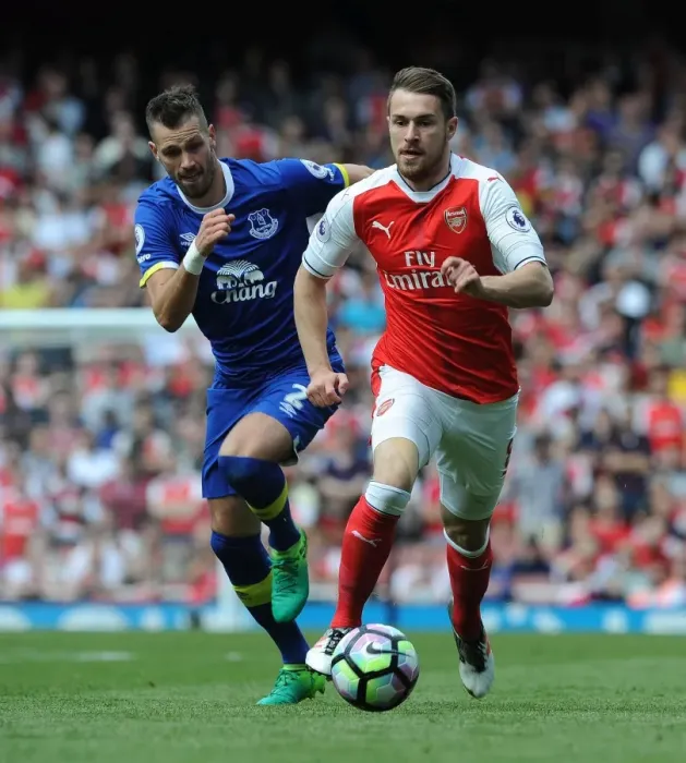 Framed Print : Arsenal's Ramsey Clashes with Everton's Schneiderlin in Premier League Showdown Framed Print : Arsenal's Ramsey Clashes with Everton's Schneiderlin in Premier League Showdown