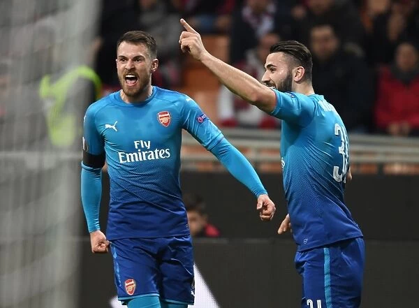 Arsenal's Ramsey and Kolasinac Celebrate Europa League Goals Against AC Milan