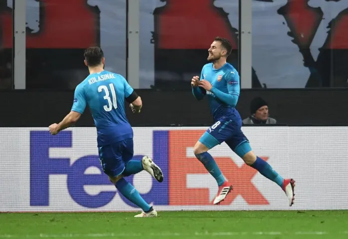 Framed Print : Arsenal's Ramsey and Kolasinac Celebrate Europa League Goals Against AC Milan Framed Print : Arsenal's Ramsey and Kolasinac Celebrate Europa League Goals Against AC Milan