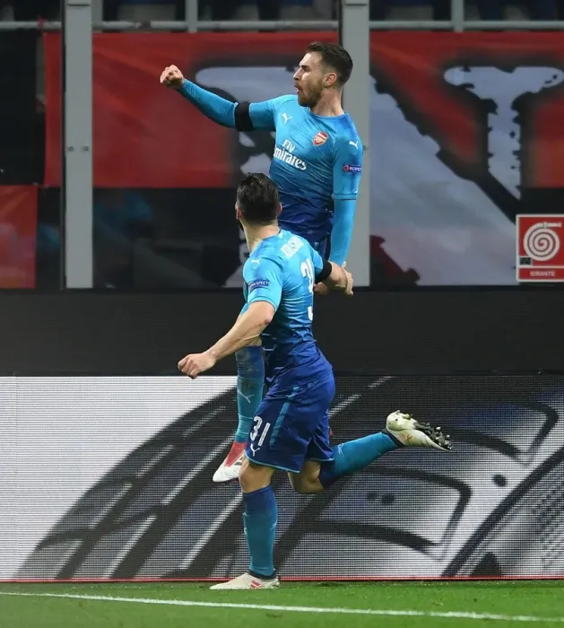 Framed Print : Arsenal's Ramsey and Kolasinac Celebrate Europa League Goals Against AC Milan