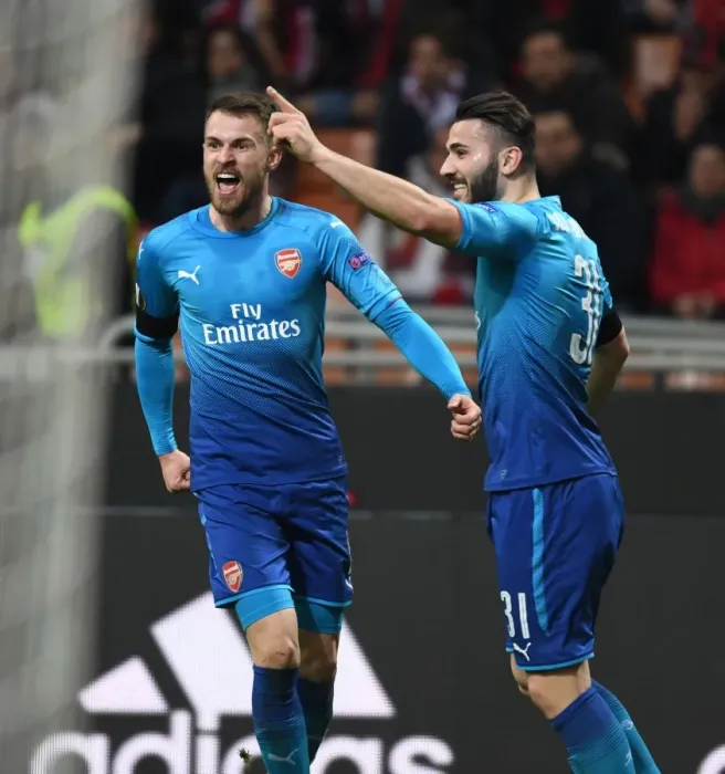 Framed Print : Arsenal's Ramsey and Kolasinac Celebrate Goals Against AC Milan in Europa League Framed Print : Arsenal's Ramsey and Kolasinac Celebrate Goals Against AC Milan in Europa League