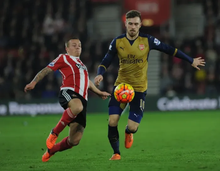 Framed Print : Arsenal's Ramsey Outwits Southampton's Clasie: Premier League Battle (December 2015)