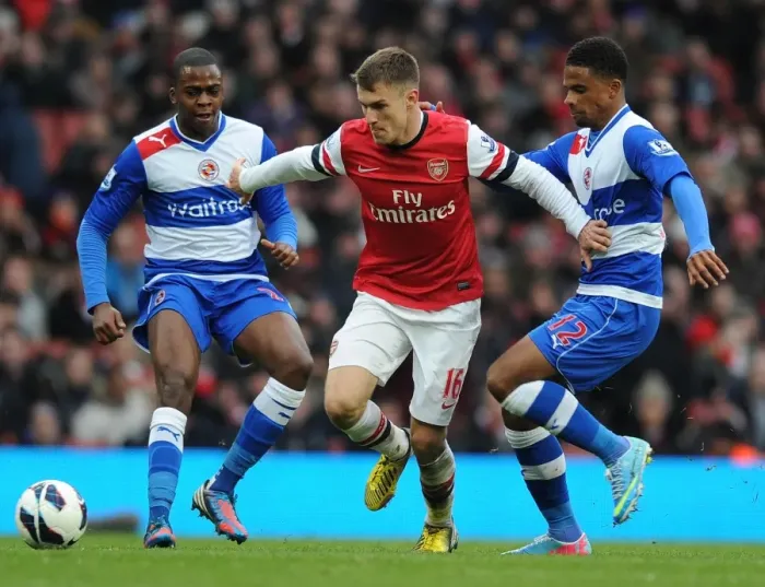 Framed Print : Arsenal's Ramsey Scores Past Reading's McCleary and Akpan (2012-13) Framed Print : Arsenal's Ramsey Scores Past Reading's McCleary and Akpan (2012-13)