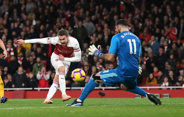 Framed Print : Arsenal's Ramsey Thwarted by Patricio in Premier League Clash (Arsenal v Wolverhampton Wanderers 2018-19) Framed Print : Arsenal's Ramsey Thwarted by Patricio in Premier League Clash (Arsenal v Wolverhampton Wanderers 2018-19)