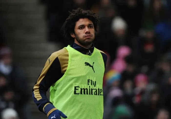 Framed Print : Arsenal's Ready Substitute: Mohamed Elneny Awaits His Premier League Debut against Stoke City Framed Print : Arsenal's Ready Substitute: Mohamed Elneny Awaits His Premier League Debut against Stoke City