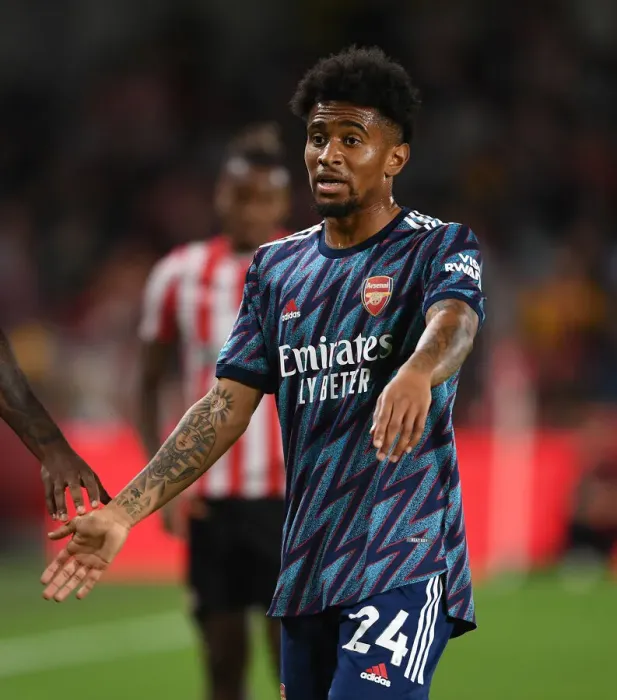 Framed Print : Arsenal's Reiss Nelson in Action against Brentford in 2021-22 Premier League Framed Print : Arsenal's Reiss Nelson in Action against Brentford in 2021-22 Premier League
