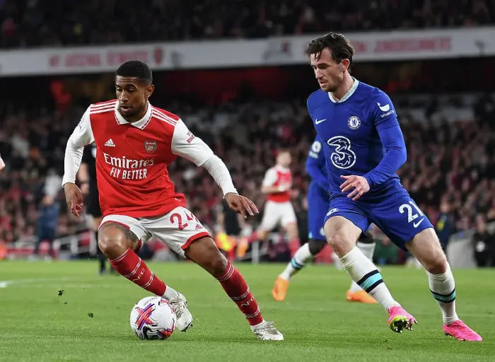 Framed Print : Arsenal's Reiss Nelson Faces Off Against Chelsea's Ben Chilwell in Intense Premier League Clash Framed Print : Arsenal's Reiss Nelson Faces Off Against Chelsea's Ben Chilwell in Intense Premier League Clash