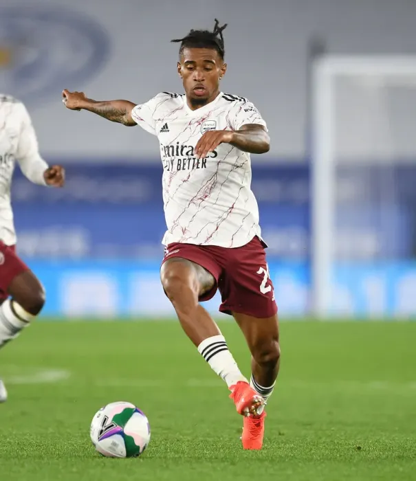 Framed Print : Arsenal's Reiss Nelson Faces Off Against Leicester City in Carabao Cup Clash