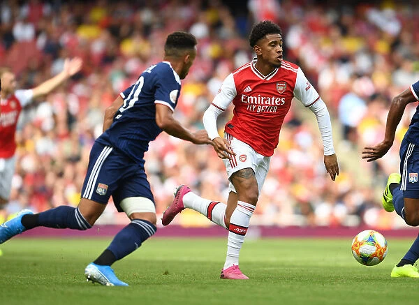 Arsenal's Reiss Nelson Goes Head-to-Head with Olympique Lyonnais Fernando Marcal at the Emirates Cup, 2019