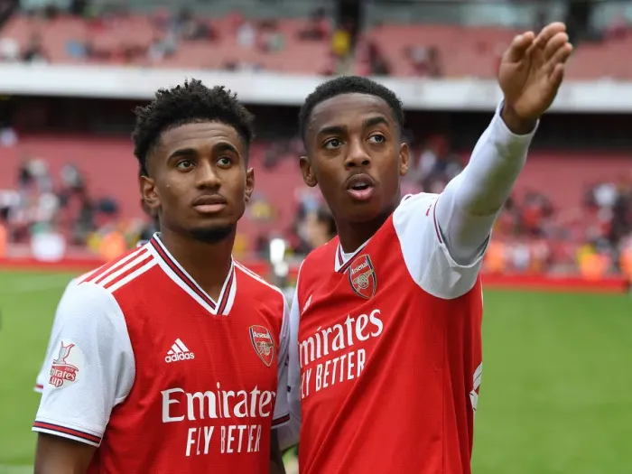 Framed Print : Arsenal's Reiss Nelson and Joe Willock Celebrate Emirates Cup Victory over Olympique Lyonnais