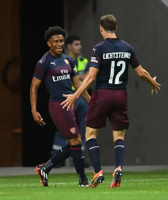 Framed Print : Arsenal's Reiss Nelson and Stephan Lichtsteiner Celebrate Goal Against SS Lazio in Stockholm Pre-Season Friendly, 2018 Framed Print : Arsenal's Reiss Nelson and Stephan Lichtsteiner Celebrate Goal Against SS Lazio in Stockholm Pre-Season Friendly, 2018