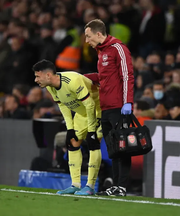 Framed Print : Arsenal's Ricky O'Donoghue Tends to Injured Gabriel Martinelli during Crystal Palace Match (2021-22)