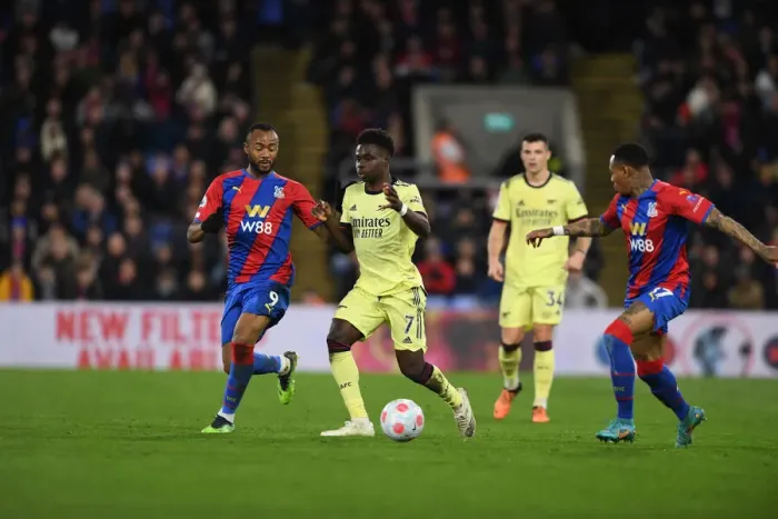 Framed Print : Arsenal's Ricky O'Donoghue Tends to Injured Gabriel Martinelli during Crystal Palace vs Arsenal (2021-22)