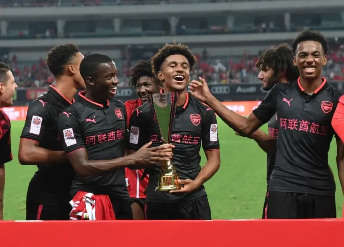 Framed Print : Arsenal's Rising Stars: Reiss Nelson, Joe Willock, and Eddie Nketiah in Action against Bayern Munich (2017-18)