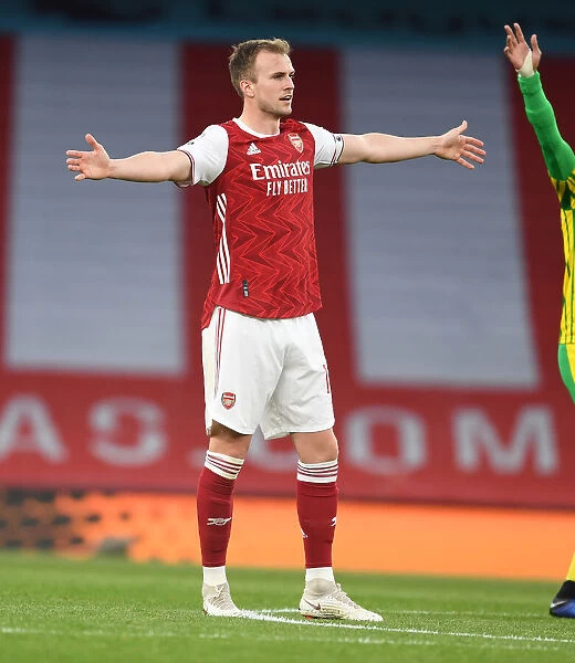 Arsenal's Rob Holding in Action: A Behind-Closed-Doors Battle against West Bromwich Albion (2020-21)