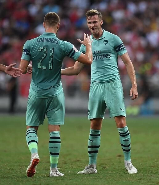 Arsenal's Rob Holding and Calum Chambers Celebrate Goal Against Paris Saint-Germain in 2018 International Champions Cup