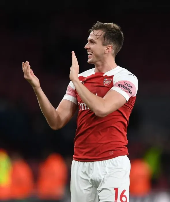 Framed Print : Arsenal's Rob Holding Celebrates Derby Win with Ardent Fans